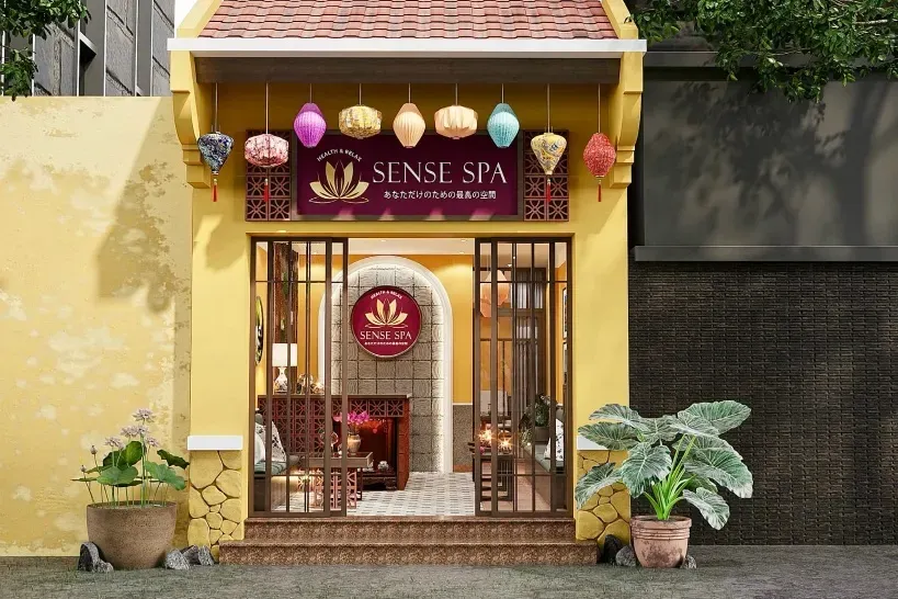 胡志明 Đông Du 街巷内黄色楼里的 SENSE SPA 外观